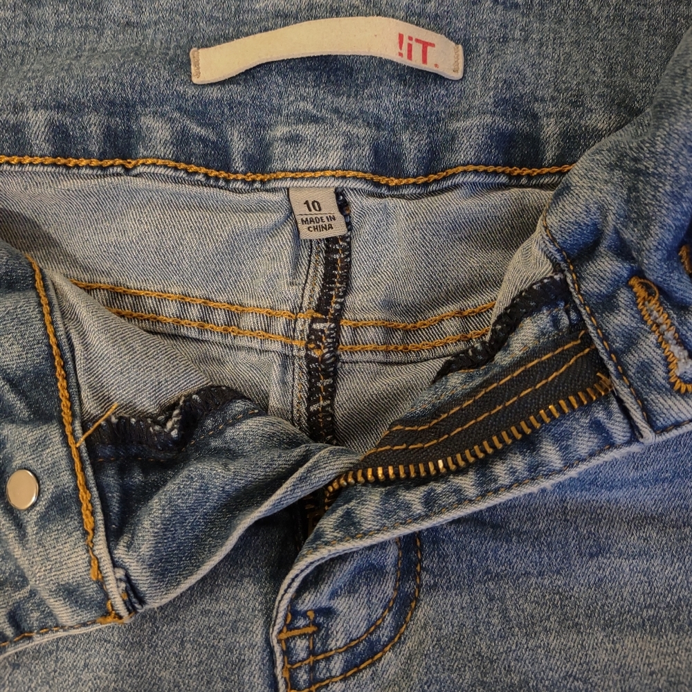 Distressed faded denim skirt